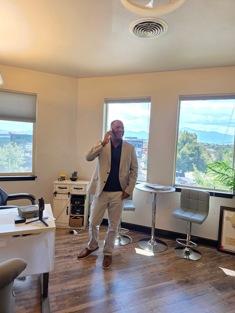 Ronnie Haskins on a call in his Colorado Springs office