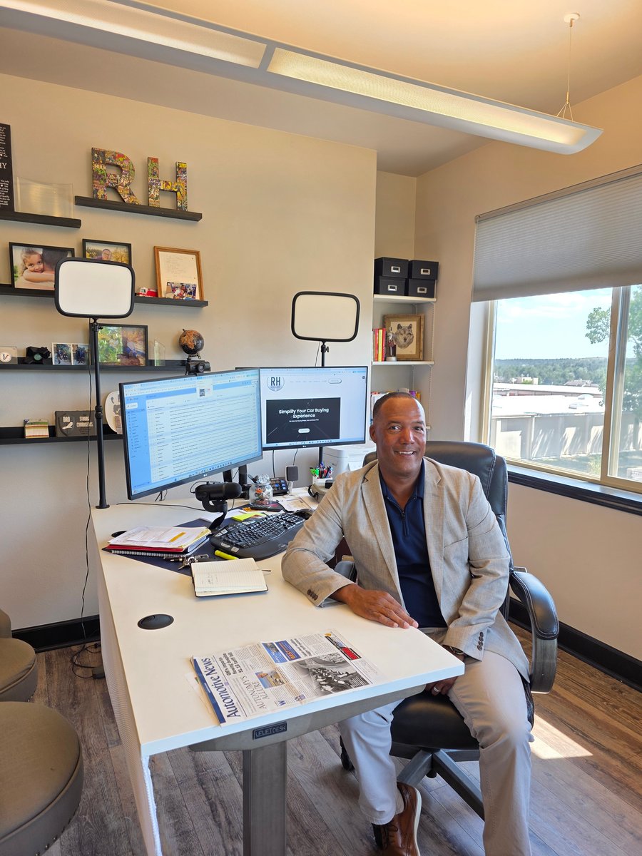 Ronnie Haskins at his desk, reviewing the numbers